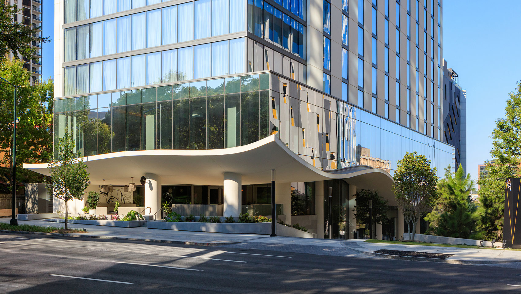 Shane hotel exterior with glass windows