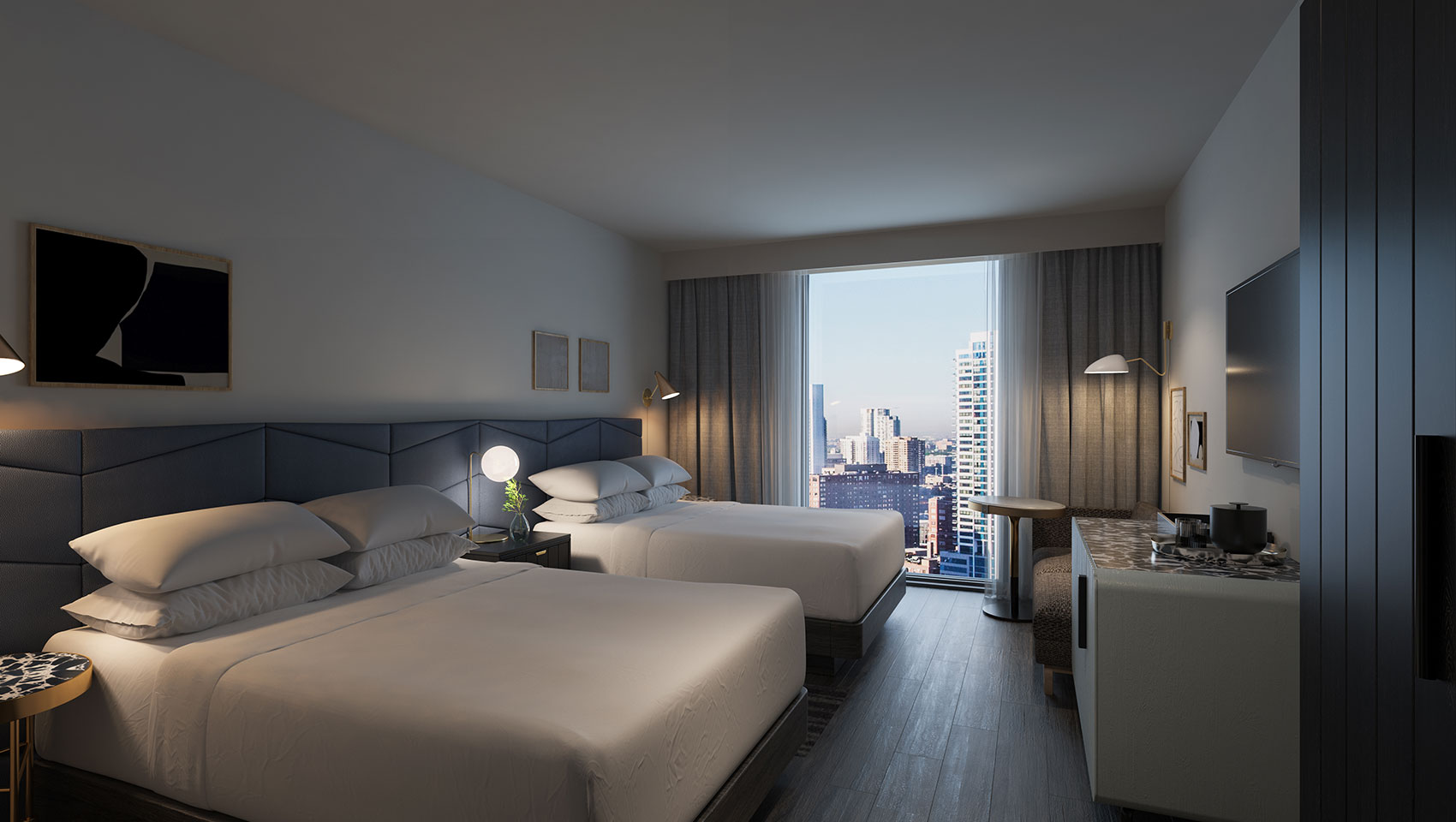 two queen size beds with a city view
