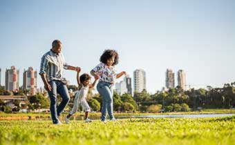 Family walking in park